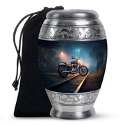 Indigo Bike Cremation Urn back view with polished surface - ornate monarch-style bike relief on brushed aluminum - full-size 10 inch 200 cubic inch adult cremation urn