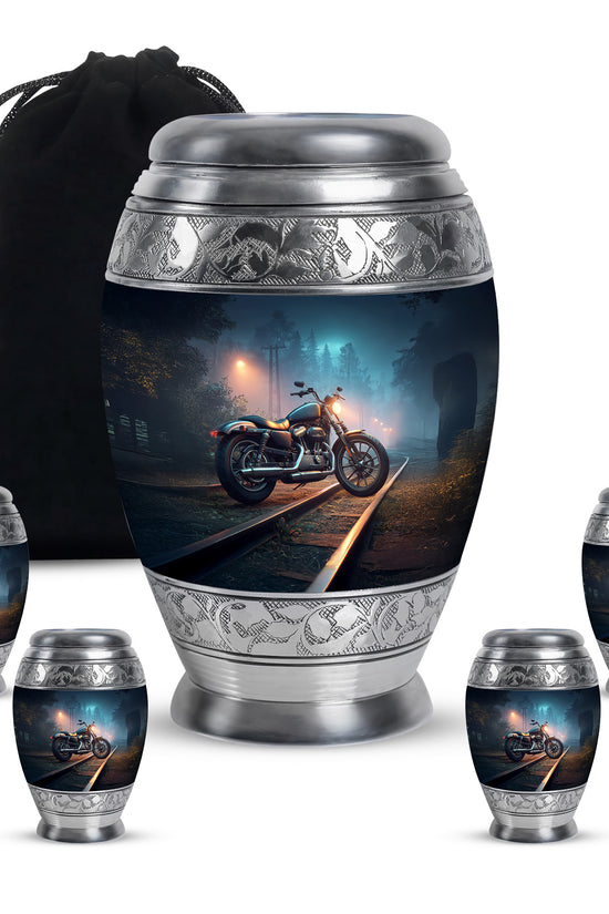 Bright Blue Bike Cremation Urn detail view - royal bike engraving with decorative scrollwork - memorial set with one large and four small urns