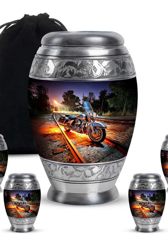 Azure Bike Cremation Urn detail view - regal bike design with crown-inspired accents - memorial set with one large and four small urns