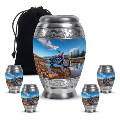 Icy Blue Bike Cremation Urn detail view - ornate monarch-style bike relief on brushed aluminum - memorial set with one large and four small urns