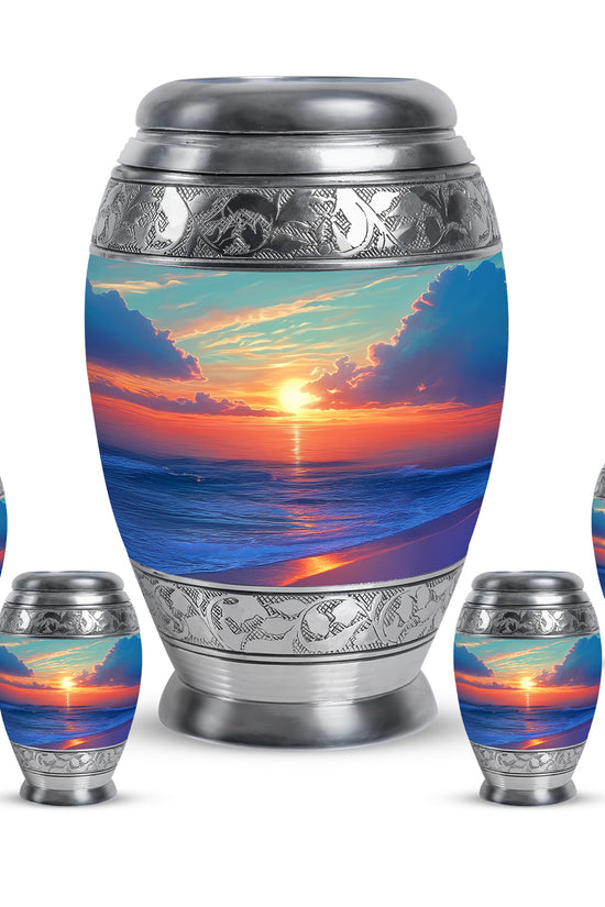 Sea Green Teal Beach Cremation Urn detail view - ornate monarch-style beach relief on brushed aluminum - memorial set with one large and four small urns