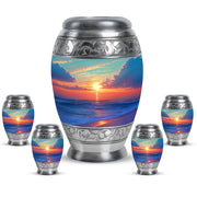 Sea Green Teal Beach Cremation Urn detail view - ornate monarch-style beach relief on brushed aluminum - memorial set with one large and four small urns