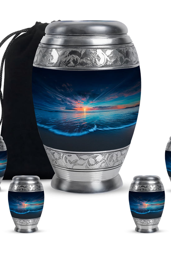 Pastel Blue Beach Cremation Urn detail view - ornate monarch-style beach relief on brushed aluminum - memorial set with one large and four small urns