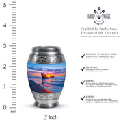Steel Blue Beach Cremation Urn lifestyle display on memorial shelf - royal beach engraving with decorative scrollwork - mini keepsake memorial for portion of cremation ashes