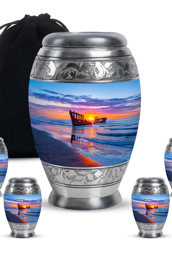 Soft Blue Beach Cremation Urn detail view - majestic beach pattern with filigree border - memorial set with one large and four small urns