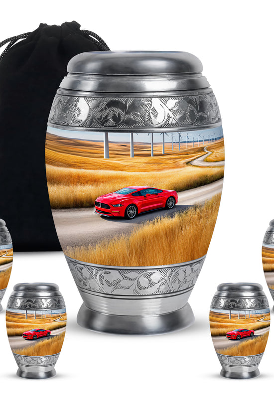 Bright Blue Car Cremation Urn detail view - royal car engraving with decorative scrollwork - memorial set with one large and four small urns
