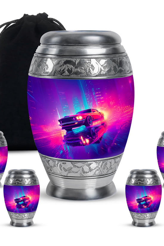 Azure Car Cremation Urn detail view - ornate monarch-style car relief on brushed aluminum - memorial set with one large and four small urns