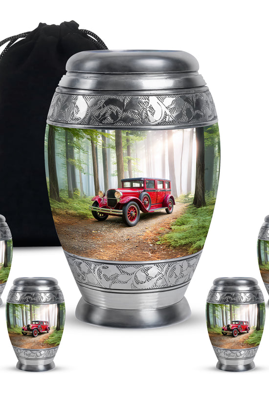 Verdant Green Car Cremation Urn detail view - ornate monarch-style car relief on brushed aluminum - memorial set with one large and four small urns