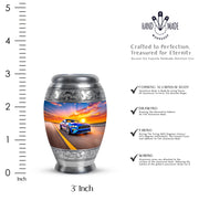 Steel Blue Car Cremation Urn lifestyle display on memorial shelf - royal car engraving with decorative scrollwork - mini keepsake memorial for portion of cremation ashes