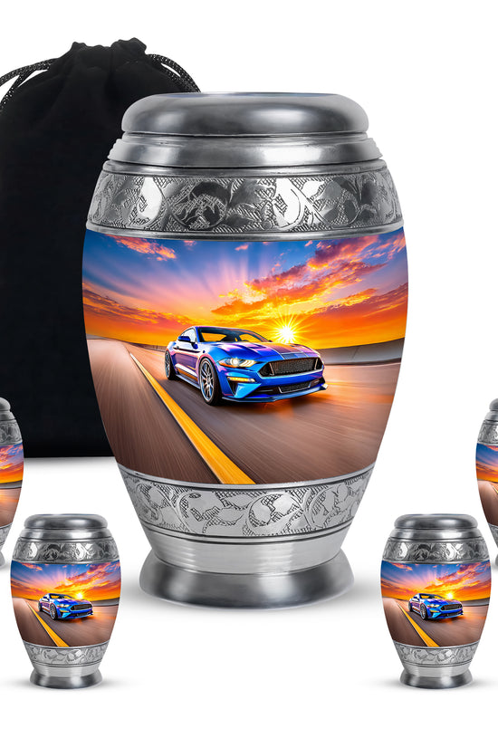 Soft Blue Car Cremation Urn detail view - royal car engraving with decorative scrollwork - memorial set with one large and four small urns