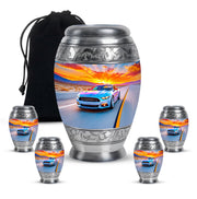 Cobalt Blue Car Cremation Urn detail view - royal car engraving with decorative scrollwork - memorial set with one large and four small urns