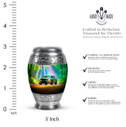 Jewel Teal Car Cremation Urn lifestyle display on memorial shelf - ornate monarch-style car relief on brushed aluminum - mini keepsake memorial for portion of cremation ashes