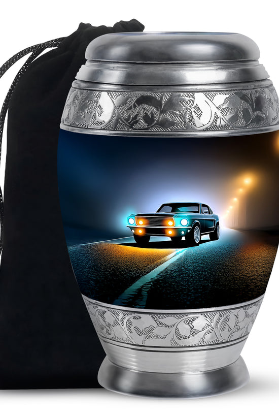 Glossy Black Car Cremation Urn back view with polished surface - ornate monarch-style car relief on brushed aluminum - full-size 10 inch 200 cubic inch adult cremation urn