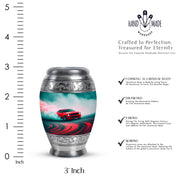Soft Teal Car Cremation Urn lifestyle display on memorial shelf - ornate monarch-style car relief on brushed aluminum - mini keepsake memorial for portion of cremation ashes