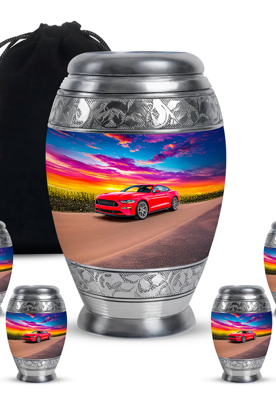 Calming Blue Car Cremation Urn detail view - royal car engraving with decorative scrollwork - memorial set with one large and four small urns
