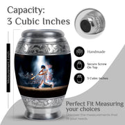 Ebony Baseball Cremation Urn lifestyle display on memorial shelf - ornate monarch-style baseball relief on brushed aluminum - mini keepsake memorial for portion of cremation ashes