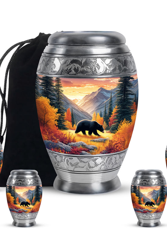 Sunrise Gold Bear Cremation Urn detail view - ornate monarch-style bear relief on brushed aluminum - memorial set with one large and four small urns