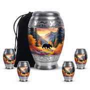 Sunrise Gold Bear Cremation Urn detail view - ornate monarch-style bear relief on brushed aluminum - memorial set with one large and four small urns