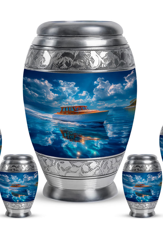 Celestial Blue Boat Cremation Urn detail view - regal boat design with crown-inspired accents - memorial set with one large and four small urns