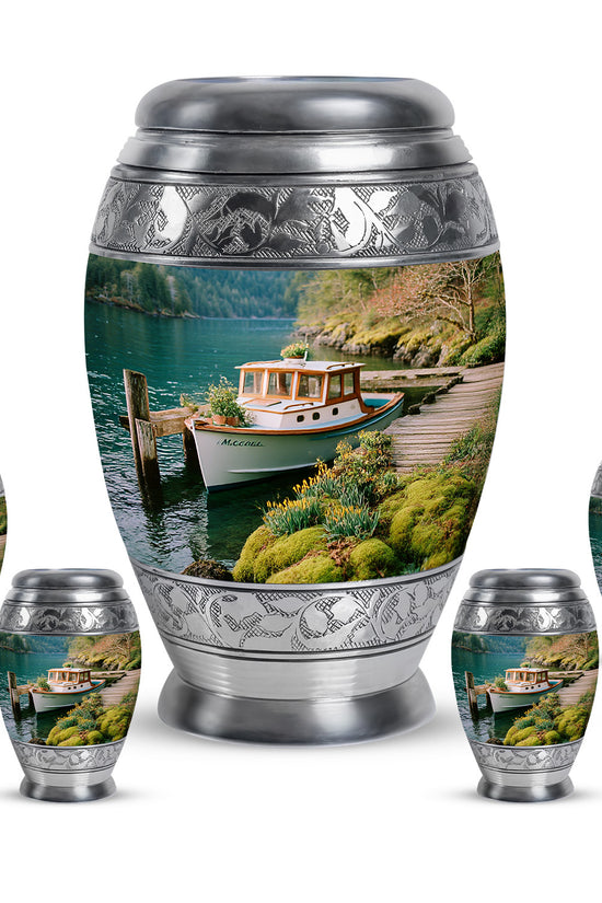 Ocean Teal Boat Cremation Urn detail view - regal boat design with crown-inspired accents - memorial set with one large and four small urns