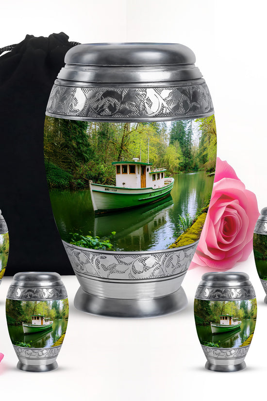 Sage Green Boat Cremation Urn detail view - regal boat design with crown-inspired accents - memorial set with one large and four small urns