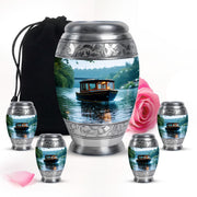 Pure White Boat Cremation Urn detail view - regal boat design with crown-inspired accents - memorial set with one large and four small urns