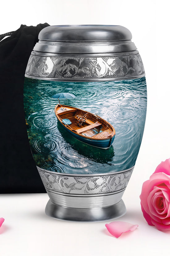 Soft Teal Boat Cremation Urn back view with polished surface - ornate monarch-style boat relief on brushed aluminum - full-size 10 inch 200 cubic inch adult cremation urn