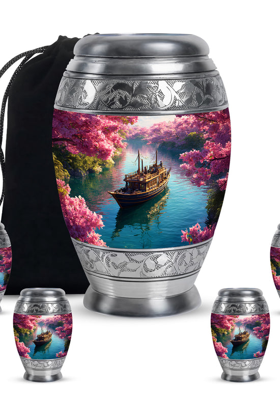 Petal Pink Boat Cremation Urn detail view - majestic boat pattern with filigree border - memorial set with one large and four small urns