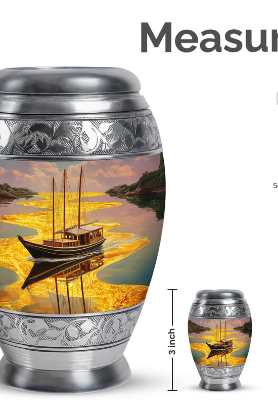 Harvest Gold Boat Cremation Urn lifestyle display on memorial shelf - royal boat engraving with decorative scrollwork - mini keepsake memorial for portion of cremation ashes