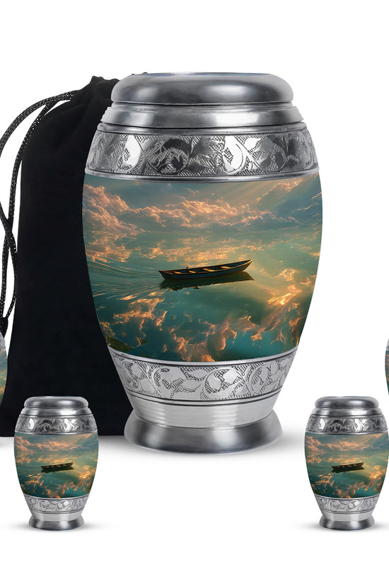 Midnight Black Boat Cremation Urn detail view - majestic boat pattern with filigree border - memorial set with one large and four small urns