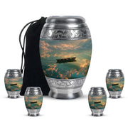 Midnight Black Boat Cremation Urn detail view - majestic boat pattern with filigree border - memorial set with one large and four small urns