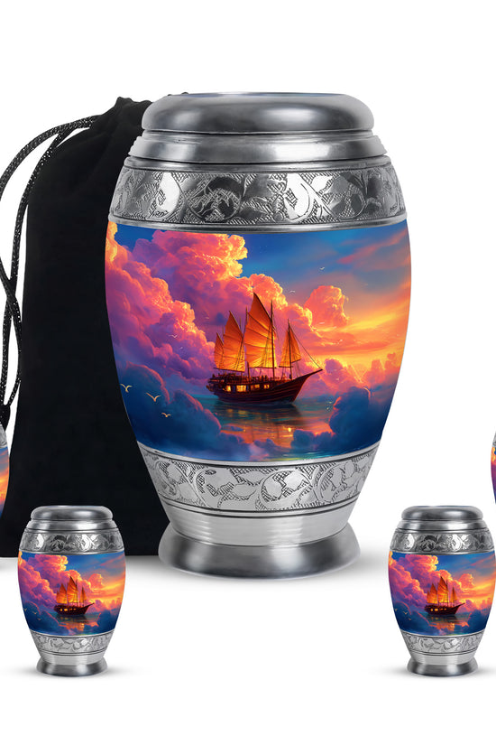 Sapphire Blue Boat Cremation Urn detail view - royal boat engraving with decorative scrollwork - memorial set with one large and four small urns