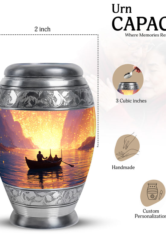 Burgundy Red Boat Cremation Urn lifestyle display on memorial shelf - ornate monarch-style boat relief on brushed aluminum - mini keepsake memorial for portion of cremation ashes
