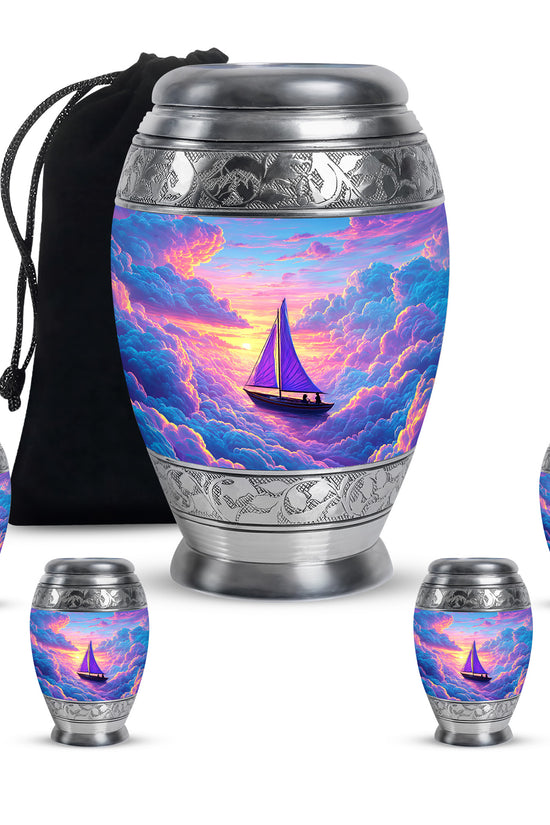Serene Blue Boat Cremation Urn detail view - majestic boat pattern with filigree border - memorial set with one large and four small urns