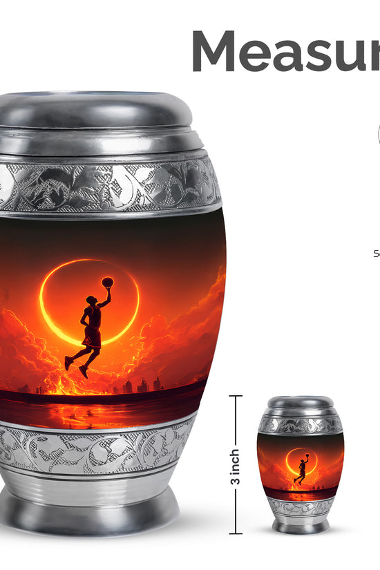Ebony Basketball Cremation Urn lifestyle display on memorial shelf - ornate monarch-style basketball relief on brushed aluminum - mini keepsake memorial for portion of cremation ashes