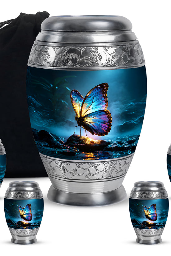 Twilight Blue Butterfly Cremation Urn detail view - royal butterfly engraving with decorative scrollwork - memorial set with one large and four small urns