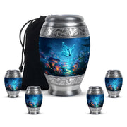 Vivid Blue Butterfly Cremation Urn detail view - royal butterfly engraving with decorative scrollwork - memorial set with one large and four small urns