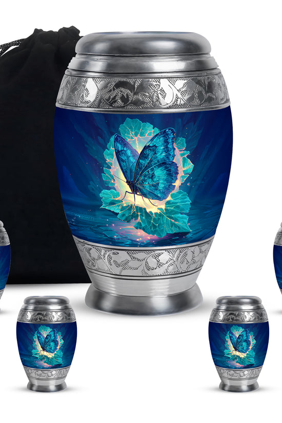 Soft Blue Butterfly Cremation Urn detail view - majestic butterfly pattern with filigree border - memorial set with one large and four small urns