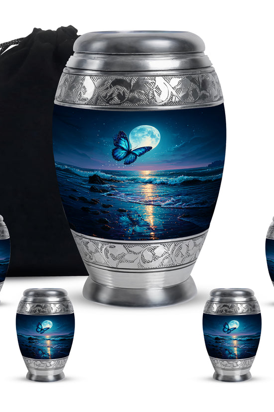 Cobalt Blue Butterfly Cremation Urn detail view - majestic butterfly pattern with filigree border - memorial set with one large and four small urns