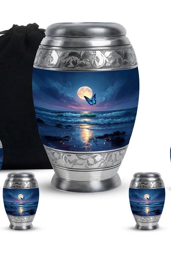 Steel Blue Butterfly Cremation Urn detail view - majestic butterfly pattern with filigree border - memorial set with one large and four small urns