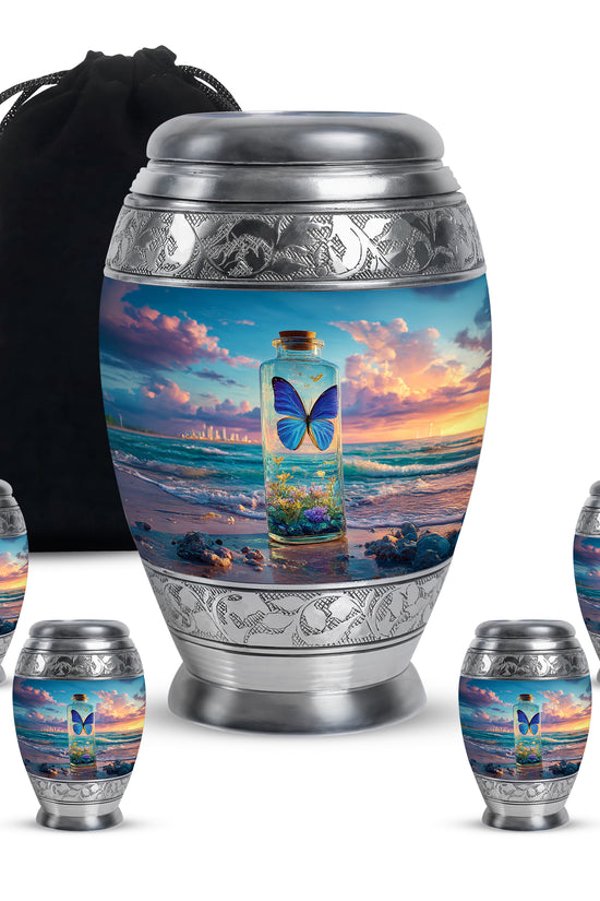 Navy Blue Butterfly Cremation Urn detail view - regal butterfly design with crown-inspired accents - memorial set with one large and four small urns