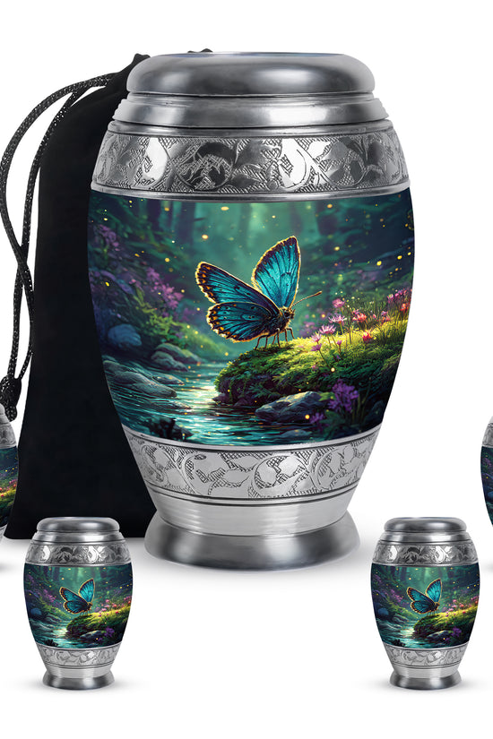 Cool Teal Butterfly Cremation Urn detail view - ornate monarch-style butterfly relief on brushed aluminum - memorial set with one large and four small urns