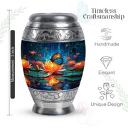 Steel Blue Butterfly Cremation Urn lifestyle display on memorial shelf - majestic butterfly pattern with filigree border - mini keepsake memorial for portion of cremation ashes