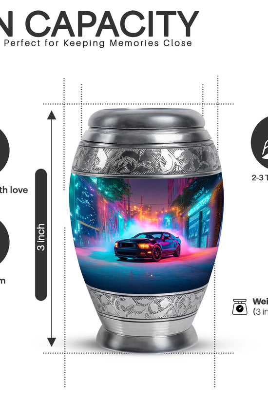 Indigo Car Cremation Urn lifestyle display on memorial shelf - ornate monarch-style car relief on brushed aluminum - mini keepsake memorial for portion of cremation ashes