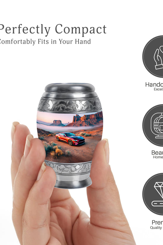 Chrome Silver Car Cremation Urn lifestyle display on memorial shelf - majestic car pattern with filigree border - mini keepsake memorial for portion of cremation ashes
