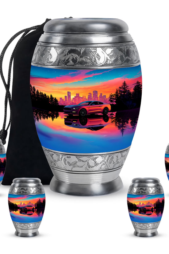 Dusty Blue Car Cremation Urn detail view - ornate monarch-style car relief on brushed aluminum - memorial set with one large and four small urns