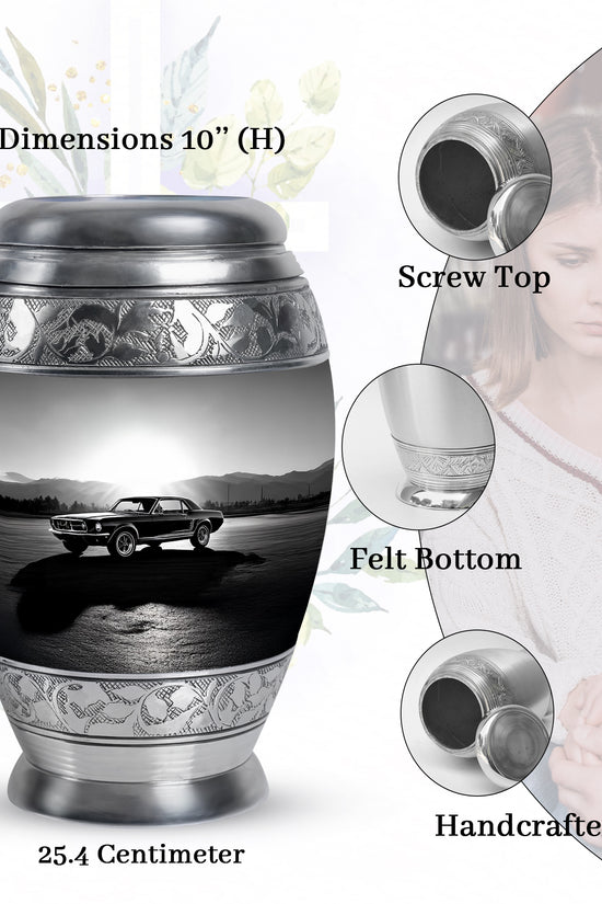 Charcoal Gray Car Cremation Urn lifestyle display on memorial shelf - ornate monarch-style car relief on brushed aluminum - mini keepsake memorial for portion of cremation ashes