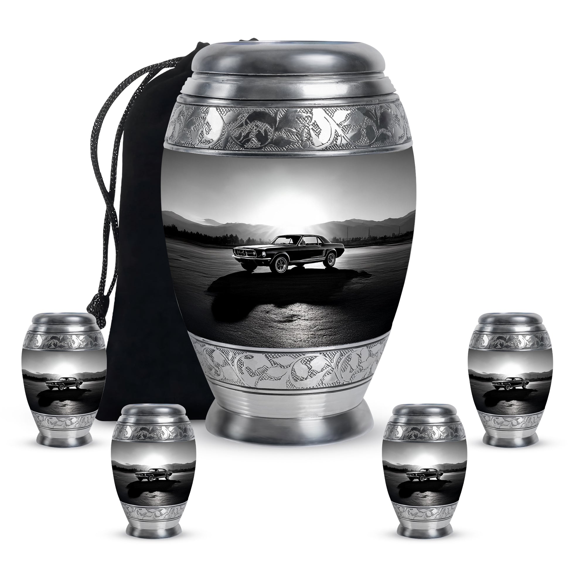 Charcoal Gray Car Cremation Urn detail view - ornate monarch-style car relief on brushed aluminum - memorial set with one large and four small urns