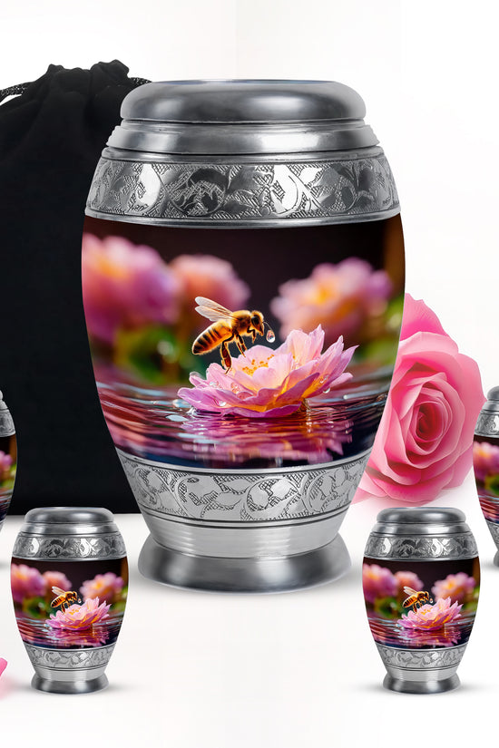 Onyx Black Bee Cremation Urn detail view - royal bee engraving with decorative scrollwork - memorial set with one large and four small urns