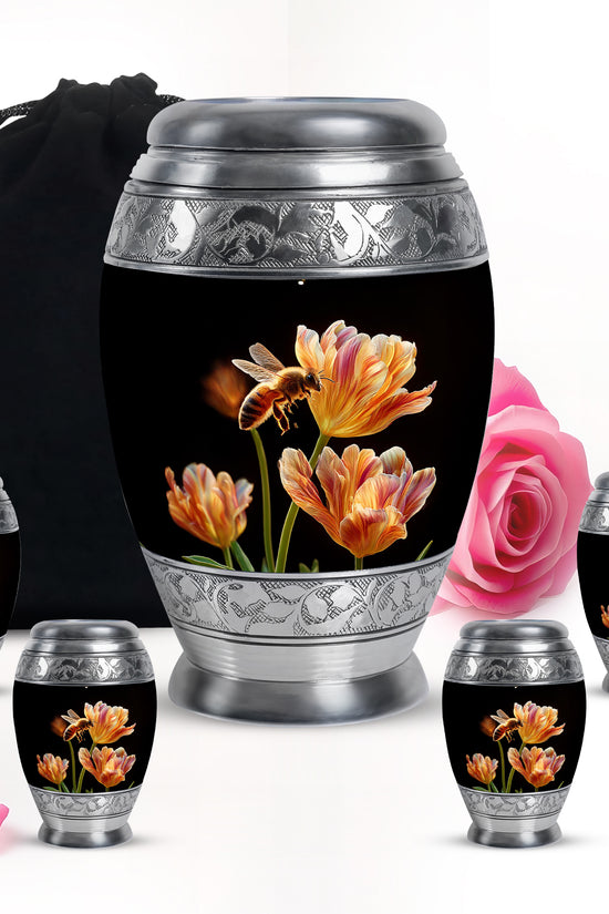 Onyx Black Bee Cremation Urn detail view - royal bee engraving with decorative scrollwork - memorial set with one large and four small urns